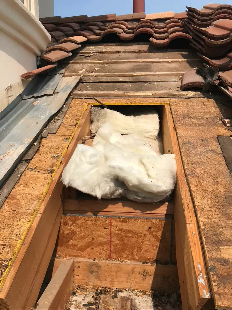 Exposed roof insulation and wooden frame