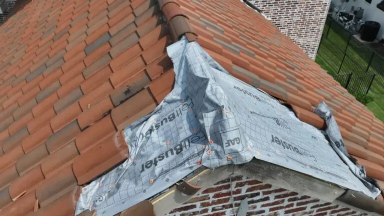 Roof under repair with protective covering