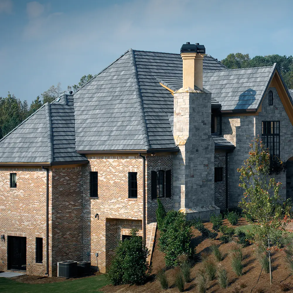 Elegant house with stone and flat slate roof