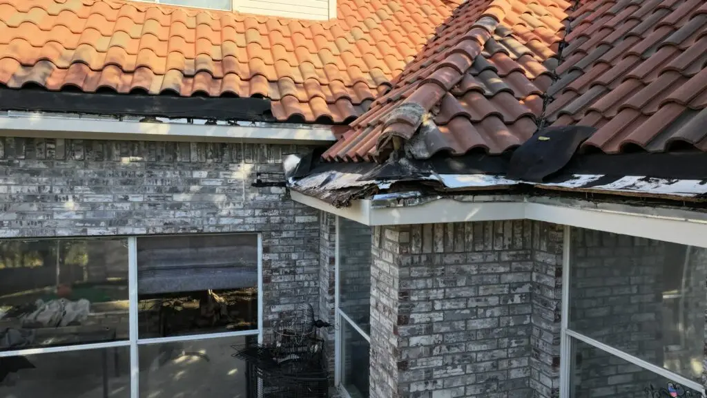 Rotted roof decking being replaced under tile roof in DFW area