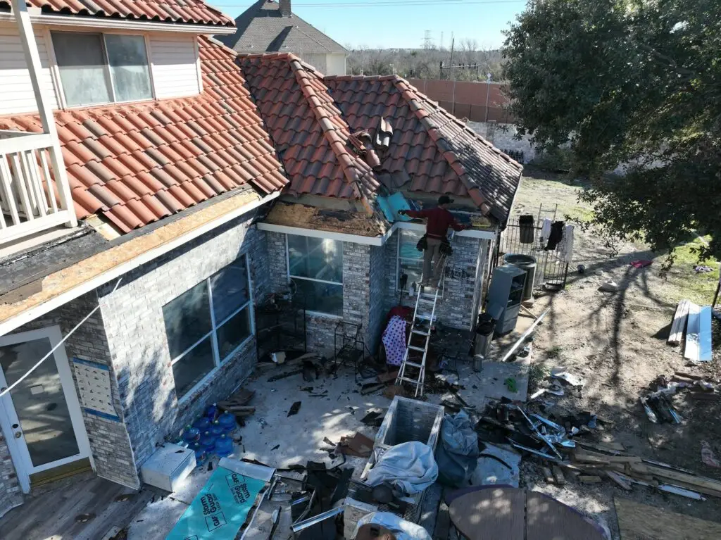 Missing and damaged gutter system before replacement in Dallas home