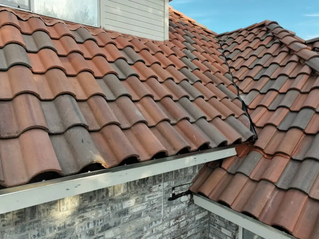 Completed tile roof edge repair and new gutter system by Shepherd Tile Roofing