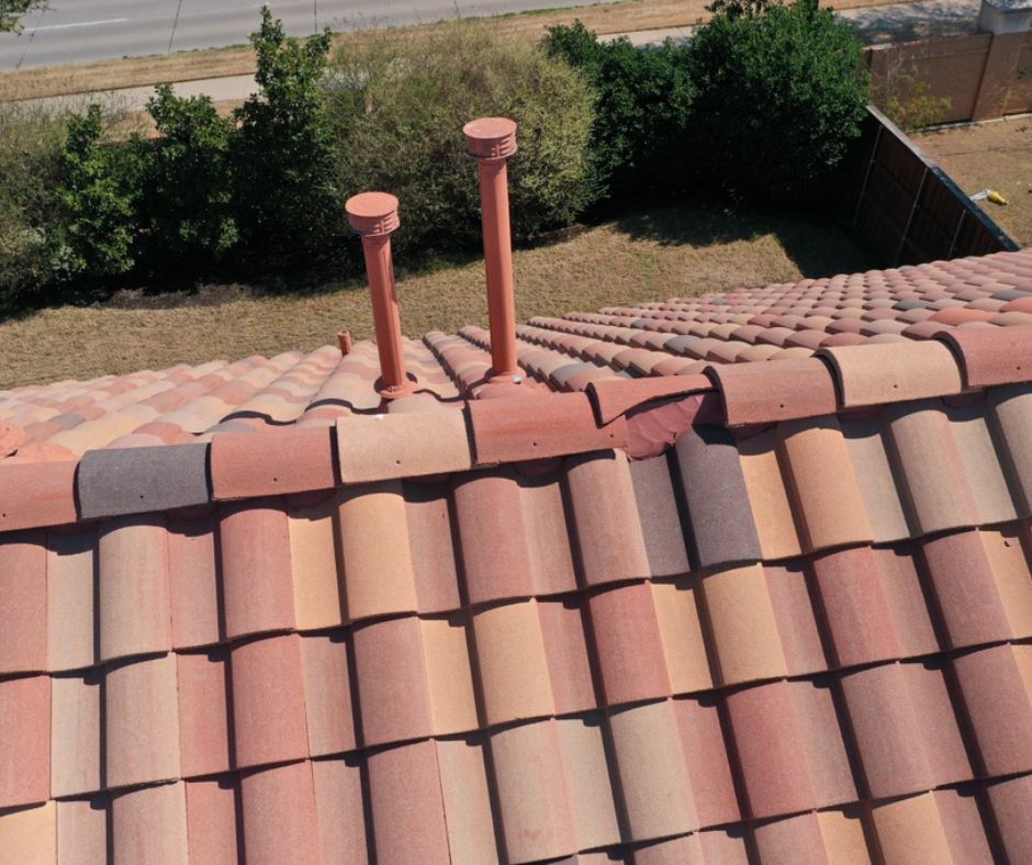 A tile roof in Waxahachie being visually inspected before cleaning