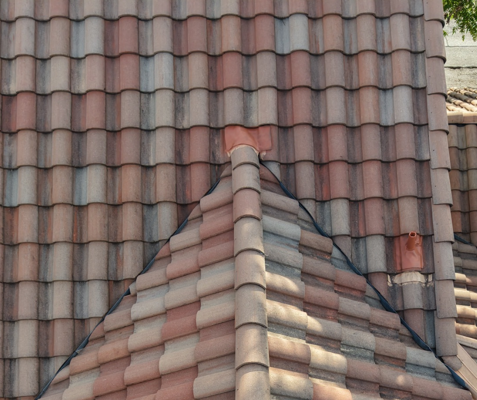 Tile roof repair in Texas showing simple flashing repair