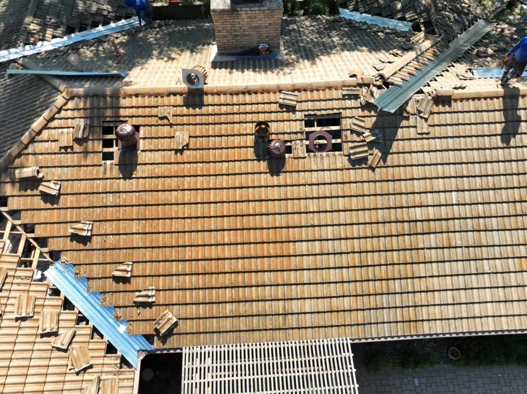 fixing old cracked tiles on older tile roof